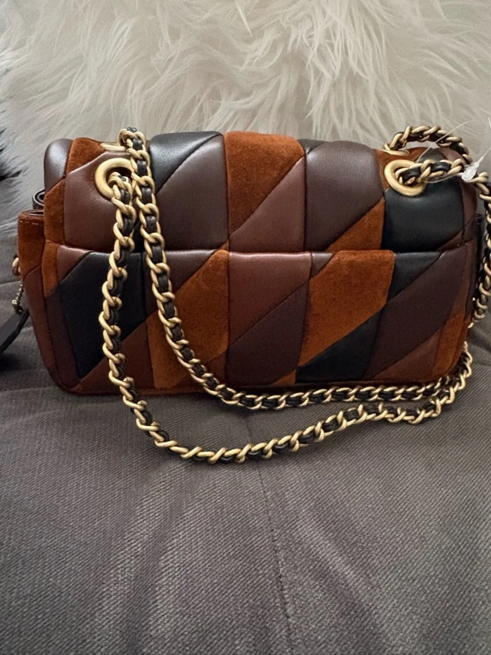 Coach Quilted Patchwork Shoulder Bag in Brown and Black Suede.
Tabby 20 - Picture 2 of 5